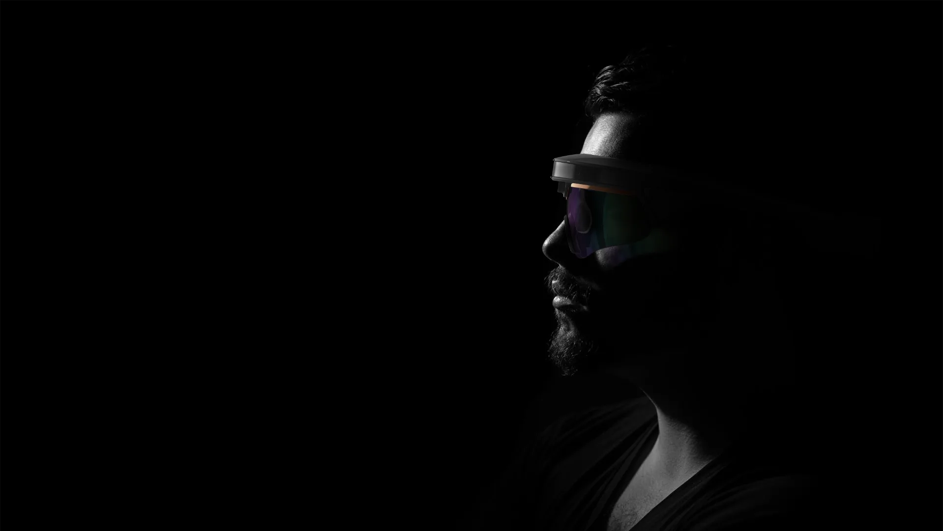 Light catches the lens — the rest disappears.